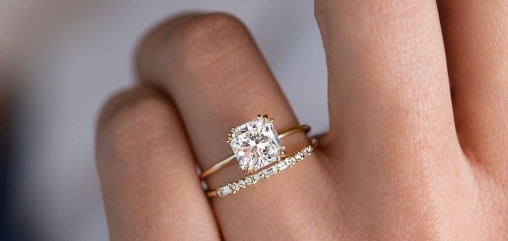 diamond engagement ring on hand